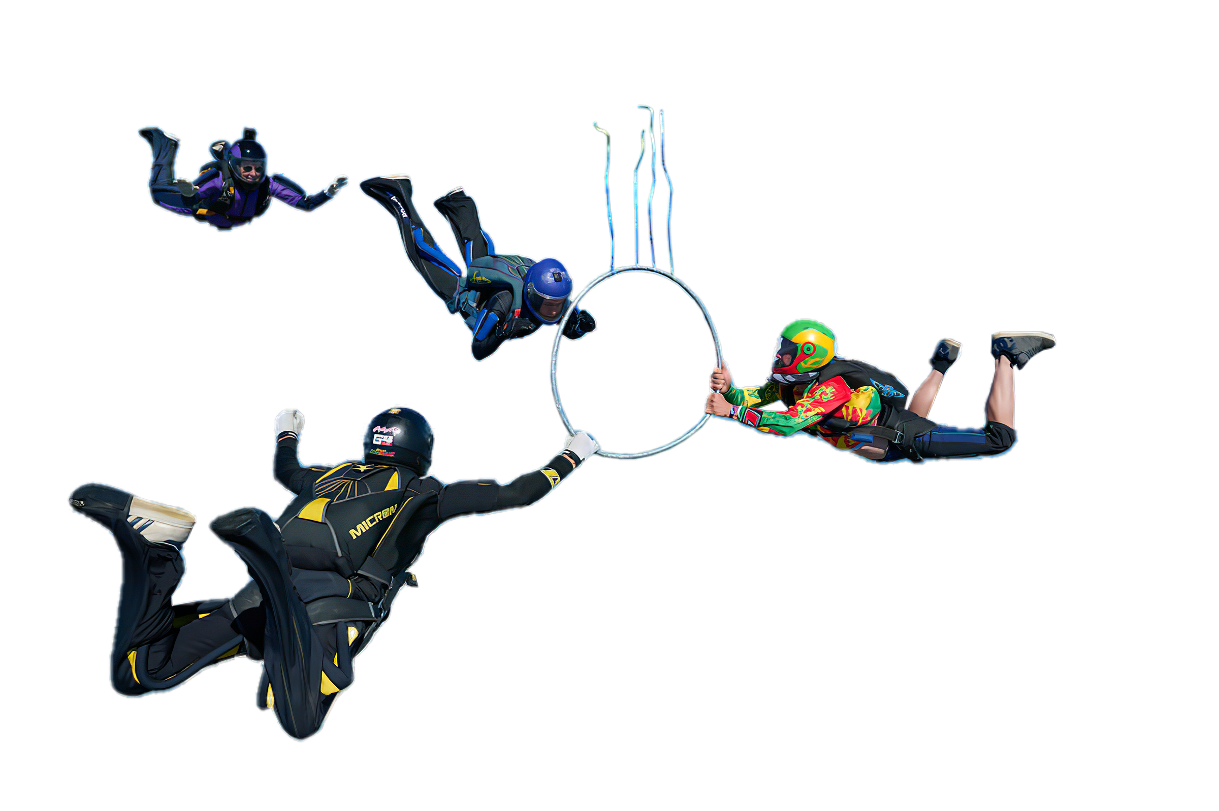 Formation skydivers flying through a hoop